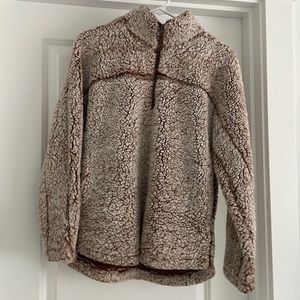 Woman’s teddy sweater with front half a zipper